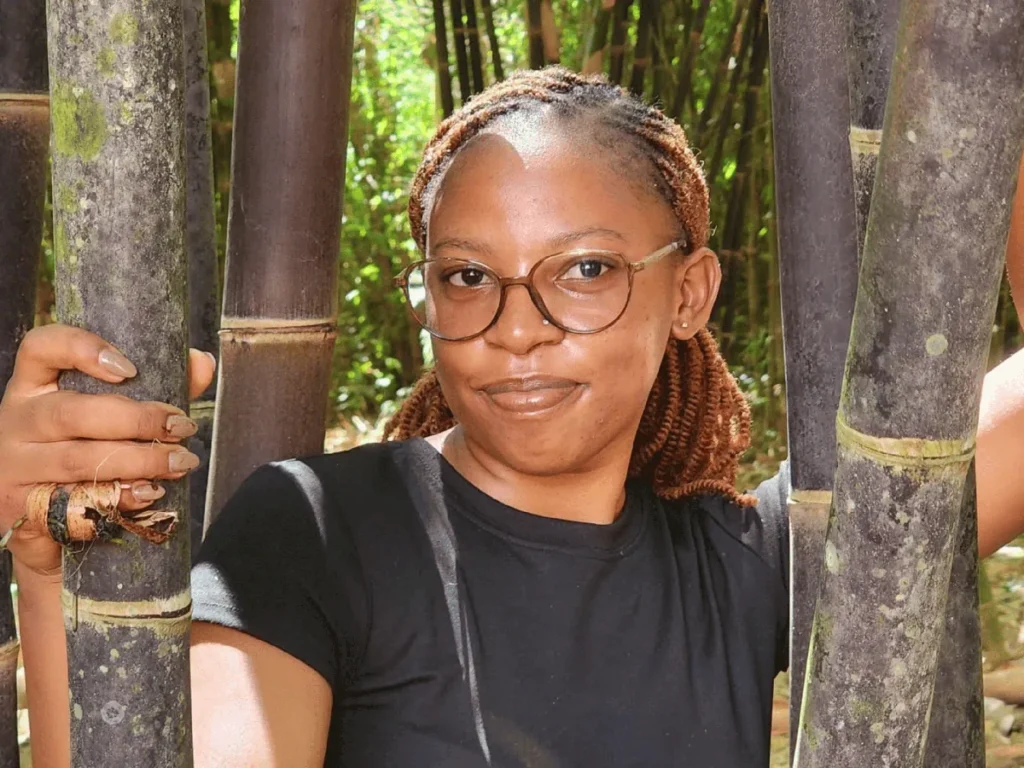 A portrait among bamboo stems