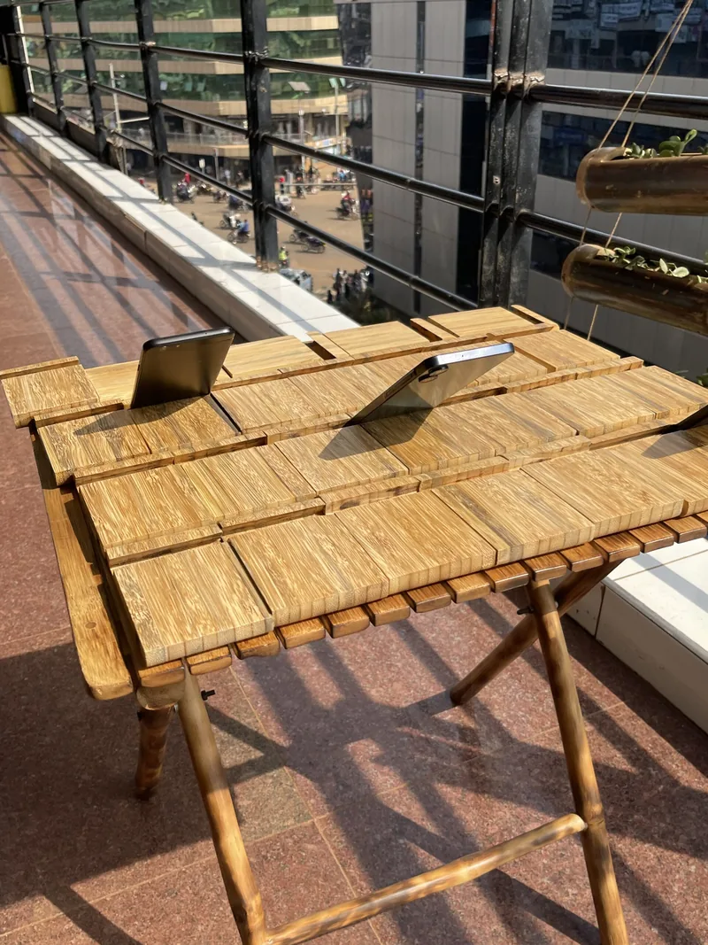 Bamboo phone holders laid out on a table